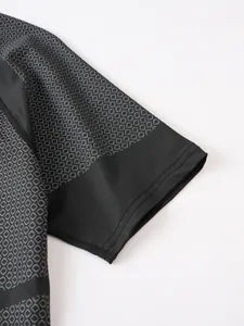 Close-up detail of a men's athletic tight T-shirt sleeve with honeycomb pattern