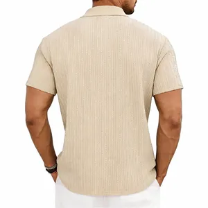 Back view of men's beige knitted polo shirt featuring intricate vertical texture details.