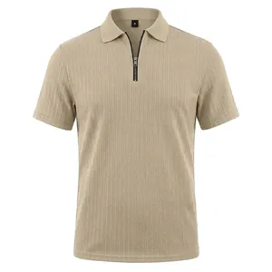 Detail view of men's beige knitted polo shirt with vertical texture and zip collar