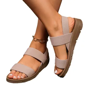 Sandali sportivi piatti beige leggeri e comodi da donna con suola morbida per esterno
