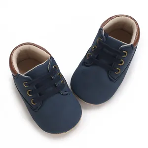 Detailed top view showing the soft texture of dark blue pre-walker shoes for baby boys