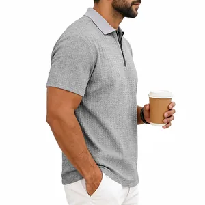 Detailed view of men's casual grey knitted polo shirt featuring textured fabric and zipper