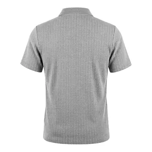 Detailed rear view of a premium gray knit polo shirt with vertical cable pattern texture.