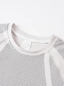 Detail view of men's athletic t-shirt neckline showing fabric texture and care label