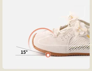 Close-up of girl's floral sneaker showing the 15-degree ergonomic toe lift design