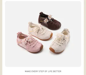 Detail view of girls' sports shoes with bow accents in four pastel and earth colors