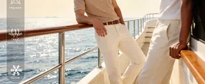 Close-up of men's ribbed knit short sleeve shirt and trousers on a luxury yacht