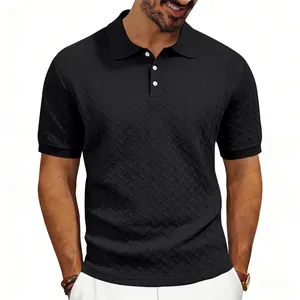 Detailed view of men's black jacquard polo shirt with textured herringbone pattern