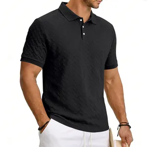 Close-up of men's slim fit black polo shirt featuring textured jacquard fabric