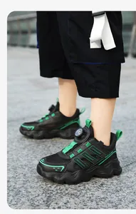 Close-up of children's breathable mesh running shoes with convenient rotating buckle