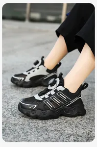 Close-up of kids running sneakers with breathable mesh and rotary buckle lace system