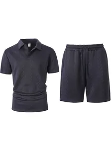 Donkerblauwe heren vrijetijdsset met polo en korte broek in jacquardstof
