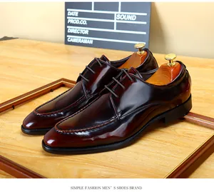 Close-up of polished burgundy cowhide leather dress shoes for men's business wear