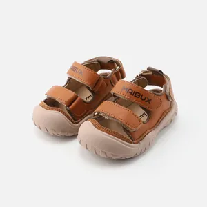 Sandalias clásicas de cuero marrón para bebés con suelas antideslizantes y tiras