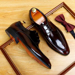 Elegant burgundy patent leather men's dress shoes for formal business or wedding wear