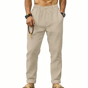 Detail view of men's lightweight beige linen casual pants with drawstring waist