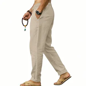 Side view of men's loose-fit khaki linen trousers for casual vacation wear