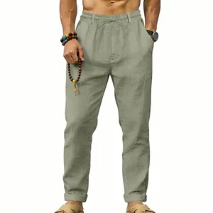 Men's sage green linen casual pants with drawstring waist for beach or office wear.