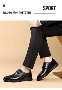 Macro view of men's black genuine cowhide leather business casual dress shoes with laces