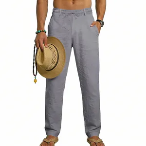 Detail view of men's grey linen casual straight leg pants with drawstring waist design