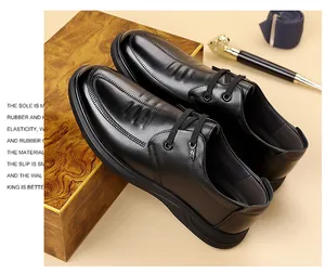 Detail view of premium black genuine leather men's business casual oxfords.