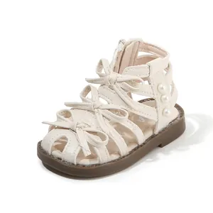 Elegante beige Baby Mädchen Gladiator Sandalen mit Schleifen und Perlen im High-Top Design