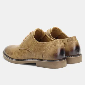 Detailed rear view of vintage brown men's leather casual shoes showing rich texture