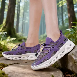 Purple breathable mesh outdoor shoes with thick white soles for summer hiking.