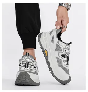 Detailed side view of grey breathable mesh safety shoes featuring a durable anti-slip MD sole