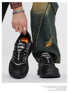 Close-up of durable black mesh safety shoes with anti-smash and anti-puncture soles