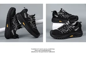 Detail view of black fly-knit safety shoes with anti-smash and puncture-resistant soles.