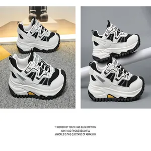 Detailed side view of breathable fly-knit safety shoes with durable chunky MD soles