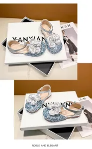 Pair of girls' silver glitter princess sandals with elegant flower ornament detail