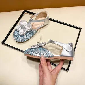 Elegant silver girl's princess sandals with glitter toe and rhinestone flower detail