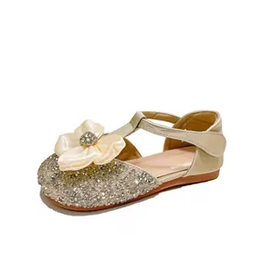 Elegant girls beige closed-toe princess sandals with silk flower and sparkling rhinestones