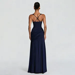 Detailed back view of an elegant navy blue evening dress with cross-back straps