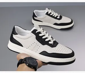 Vista dettagliata delle sneakers da uomo in pelle traspirante nere e bianche con suola spessa