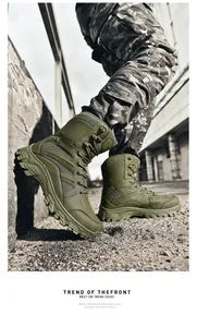 Detailed side view of olive green high-top tactical boots with rugged non-slip rubber soles