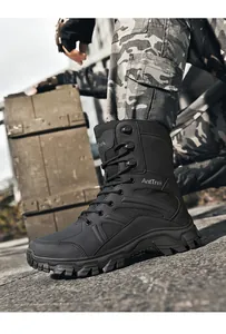Detailed side view of a black high-top breathable tactical combat boot in action.