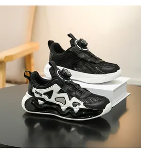 Breathable mesh children's sneakers featuring a rotary lace dial and wavy sole design.