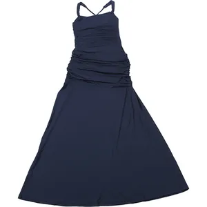 Detail view of navy ruched maxi dress with elegant cross back straps and square neck