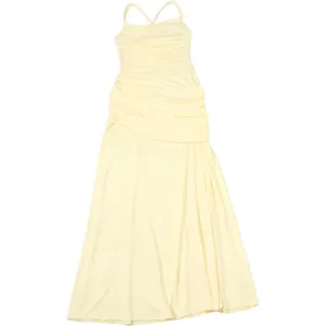 Close-up of a pale yellow ruched dress with spaghetti straps and pleated waist detail