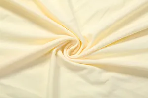 Detailed view of premium cream-colored pleated fabric with elegant soft draping texture