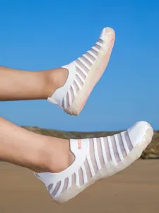 Breathable white striped water shoes for beach swimming and outdoor wading activities.