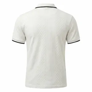 Back view of a white short-sleeved Polo shirt with jacquard texture and black tipping.