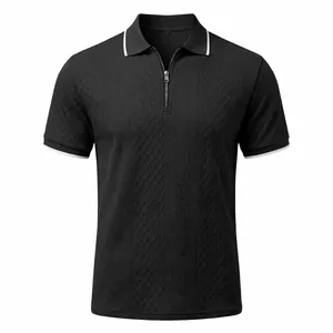 Detailed view of men's black vintage jacquard polo shirt with zipper and textured fabric