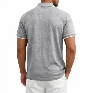 Back view of grey men's retro jacquard polo shirt showing textured herringbone pattern