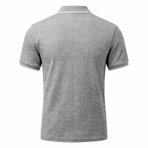 Back view of a grey men's retro jacquard polo shirt with short sleeves