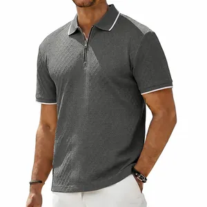 Detail of men's grey zip polo shirt with retro herringbone jacquard texture