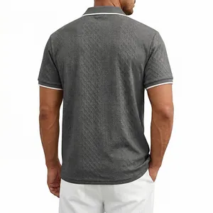 Back view of men's grey jacquard polo shirt with white tipped collar and cuffs